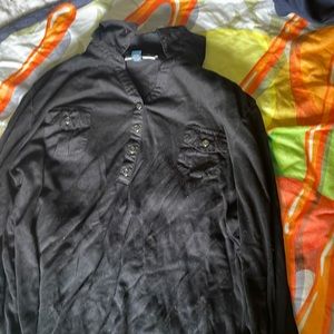 Black and silver button up dress shirt with mid length sleeves.